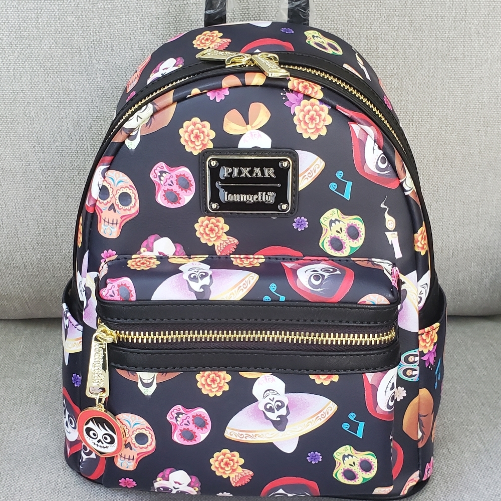 SOLD Coco AOP Loungefly Mini Backpack